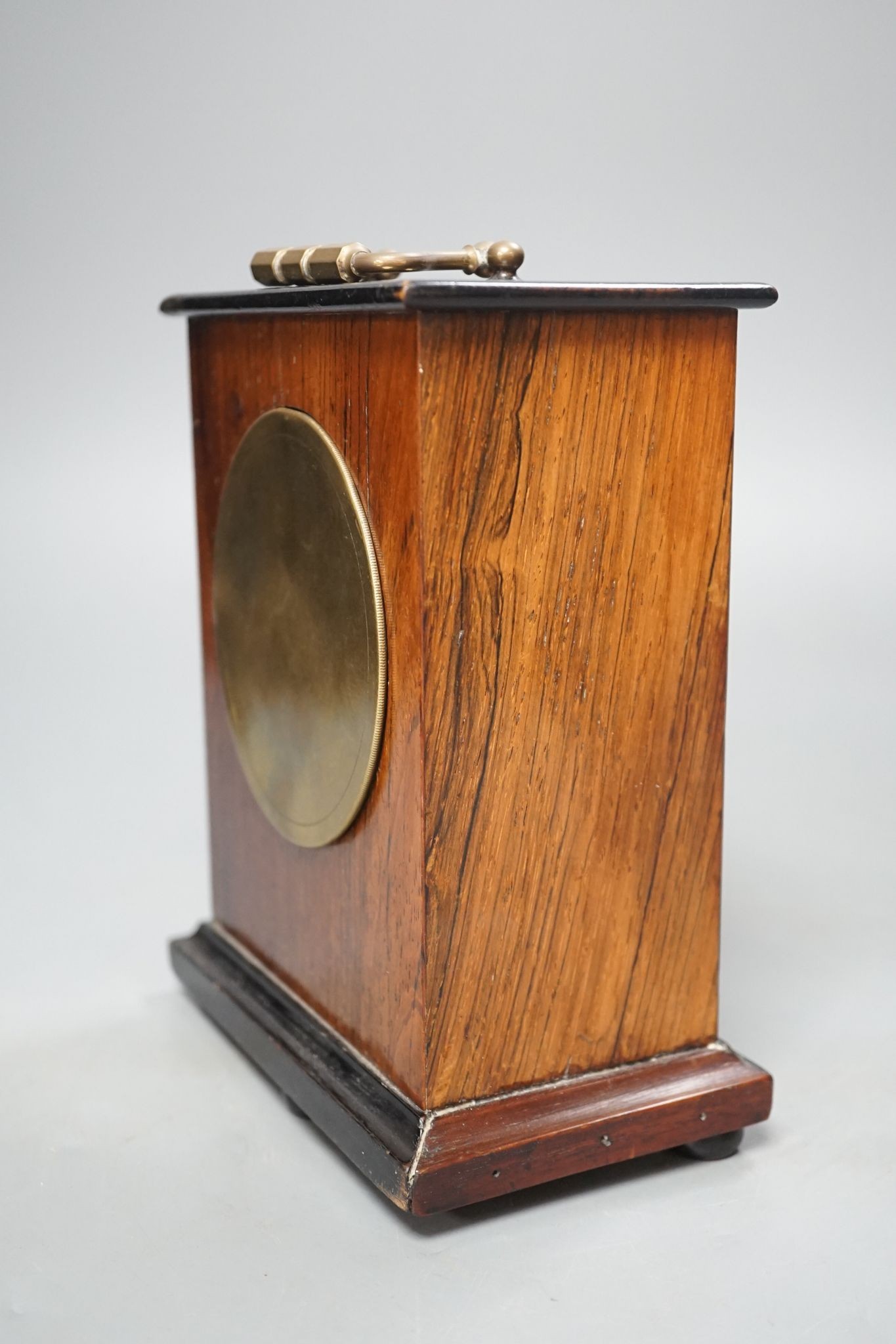 A 19th century rosewood mantel clock, French movement with key, 22cm high